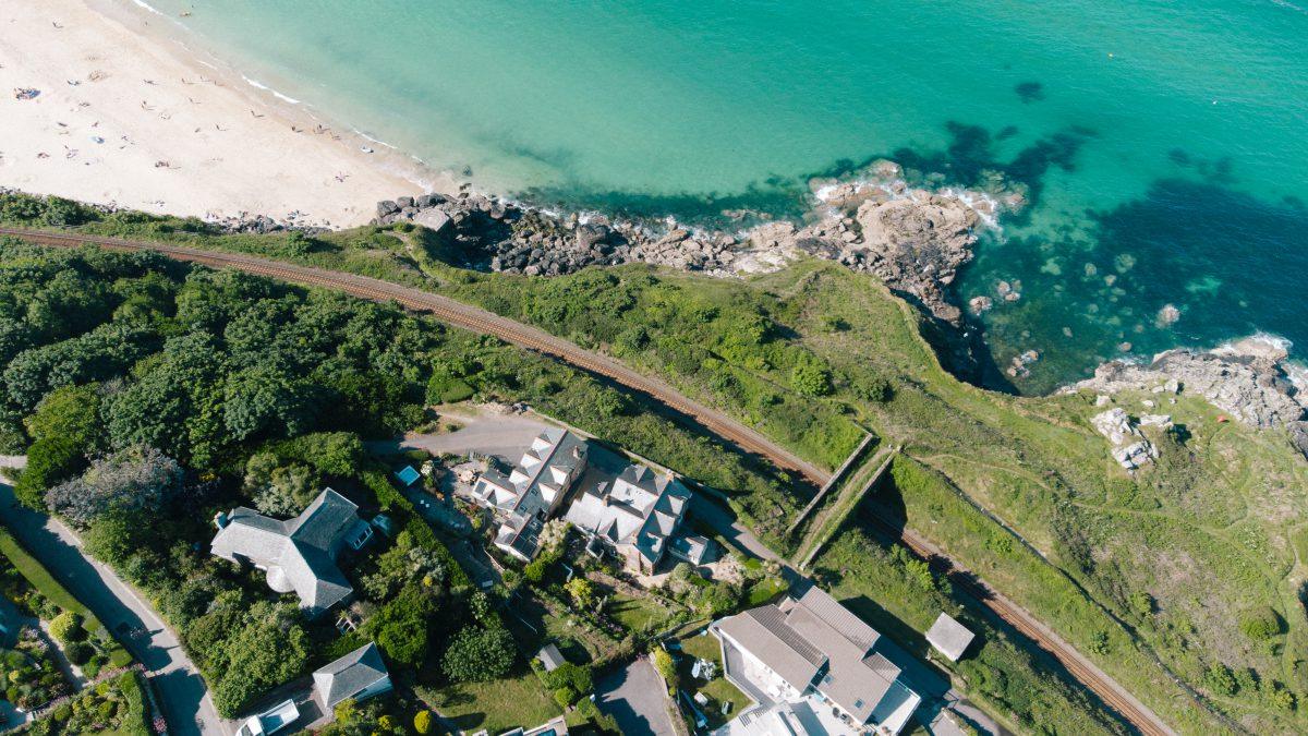 Aerial birdseye view of the Cornish coast. Shot with a drone in the St Ives area of Cornwall.