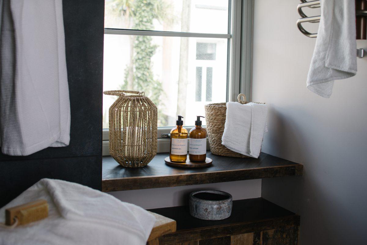 Bathroom window and products professionally styled at property in Cornwall. Shot for a holiday company.