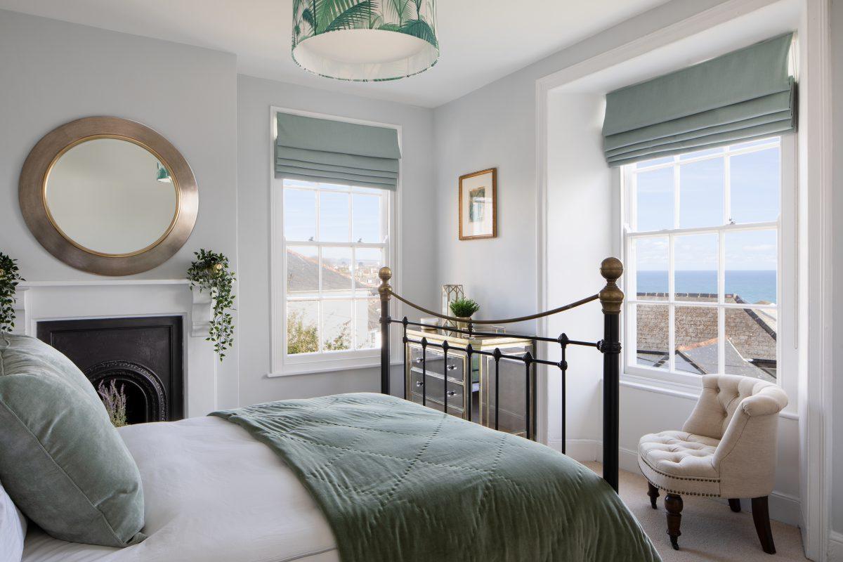 Image of bedroom shot on location in Newlyn, Cornwall for interior stylist.