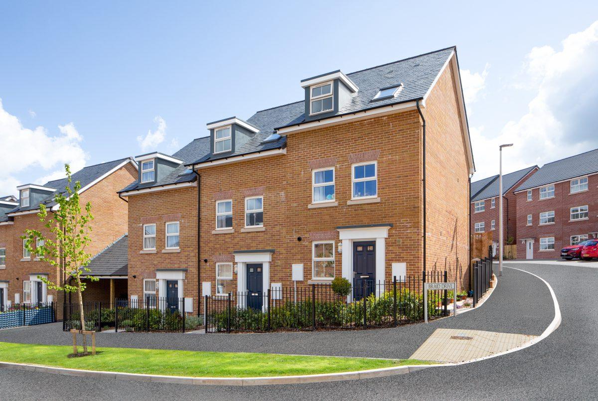 Exterior view of newly built homes on a housing development.