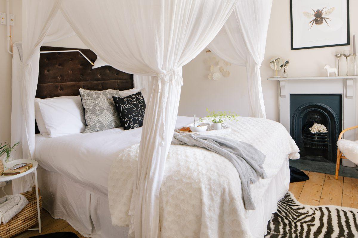 Professionally styled and photographed interior of a bedroom at a property in Cornwall.