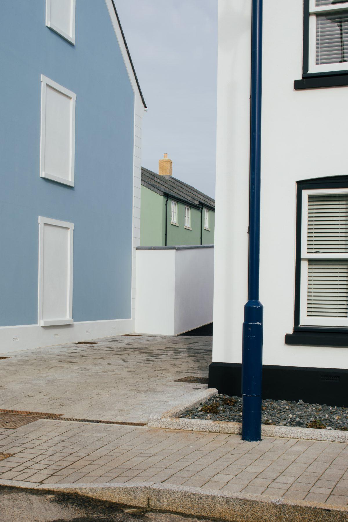 A view of the entrance to a path between two house in Nansledan, Newquay