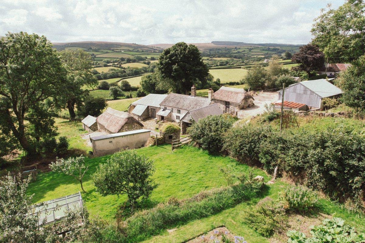 Elevated photograph of farm in remote setting on Dartmoor, Devon.