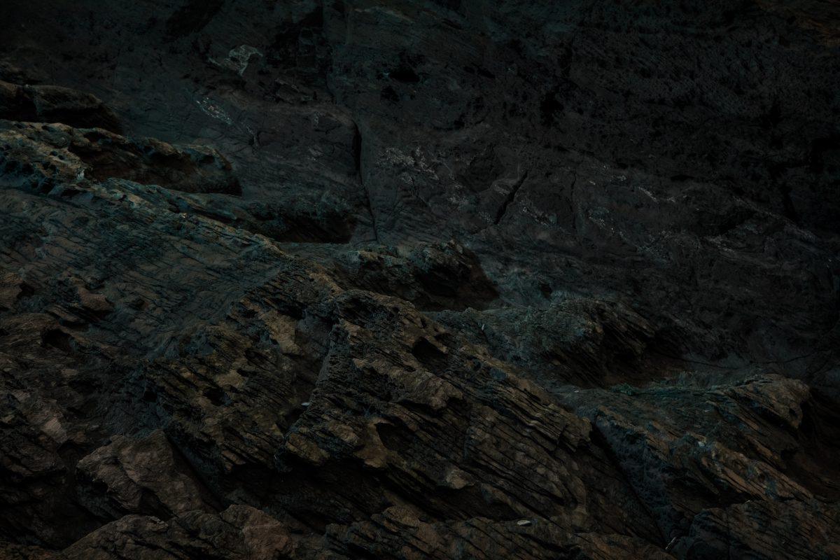 Steps carved into the cliff along the coast in the Newquay area. Photographed in low light and lit with a torch.