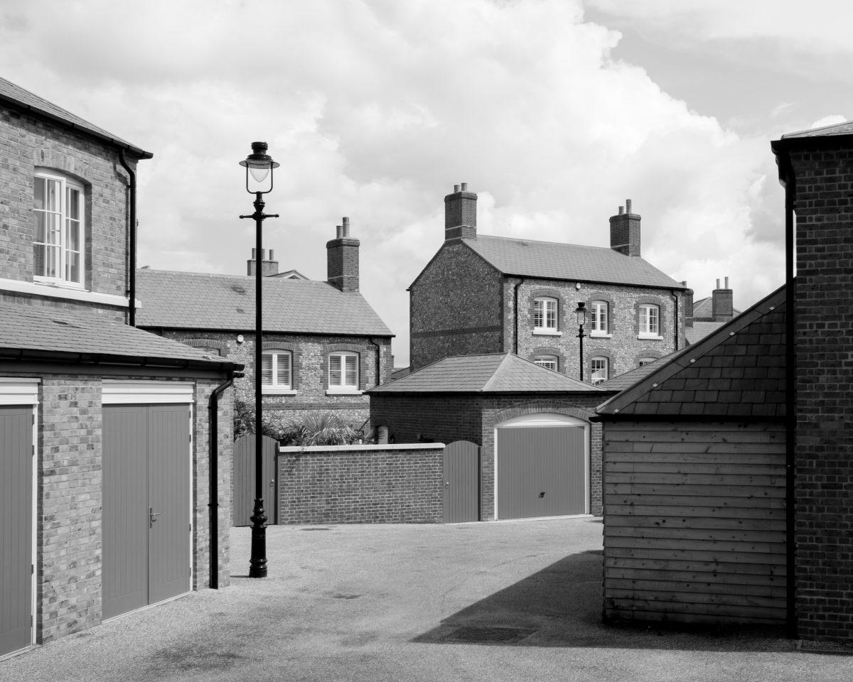 A street scene at Poundbury in Doset. Photographed in black and white.