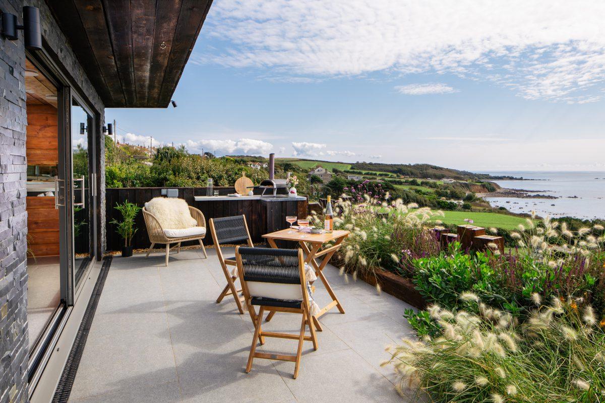 Summer house and terrace of holiday home in Marazion, Cornwall. Professionally styled and photographed.