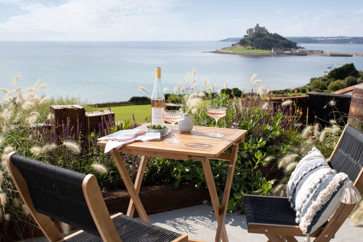 Terrace with views of St Michaels Mount in Cornwall. The house is located in Marazion.