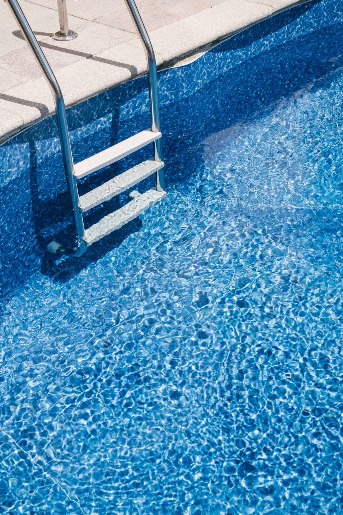 Art image of swimming pool step. Colourful detail